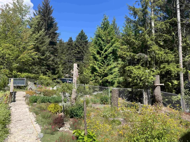 Tiered landscaping featuring a stone pathway