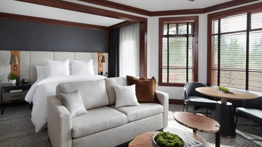 Bedroom featuring baseboards and crown molding