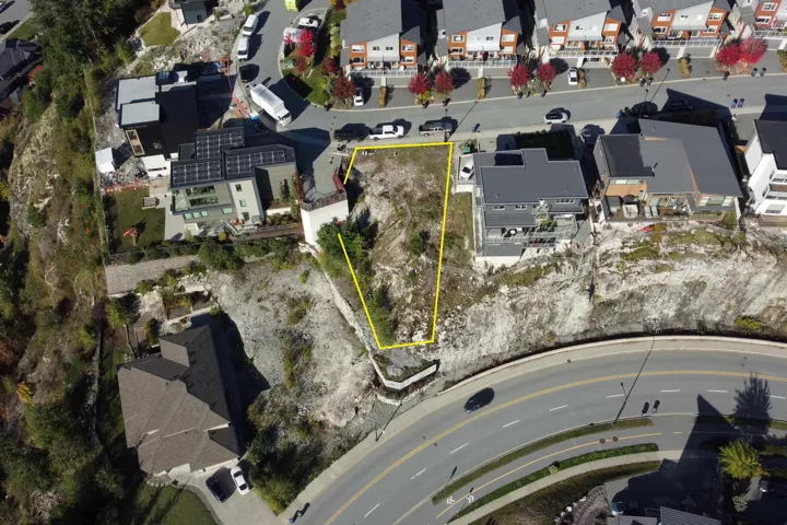 Aerial perspective of suburban area featuring property parcel outlined