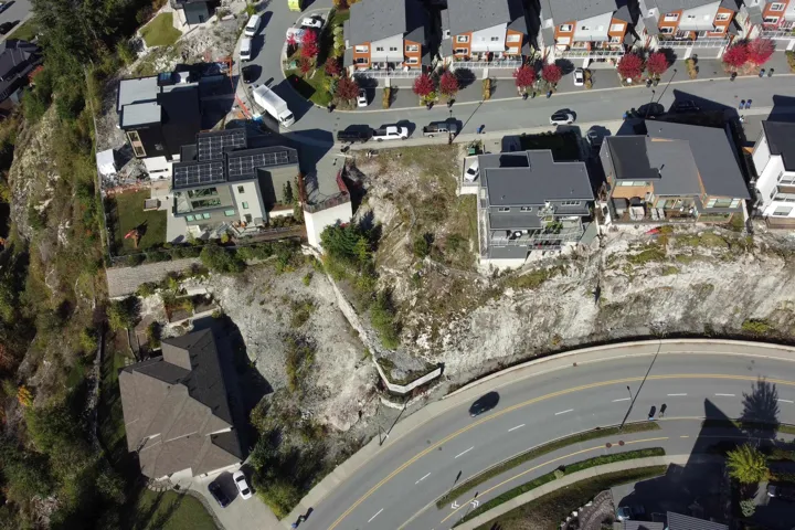 Aerial overview of property's location with nearby suburban area