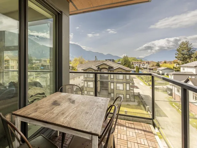 Balcony with a mountain view and a residential view