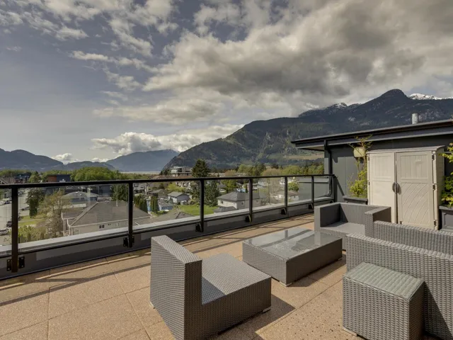 View of patio / terrace featuring a mountain view and a balcony