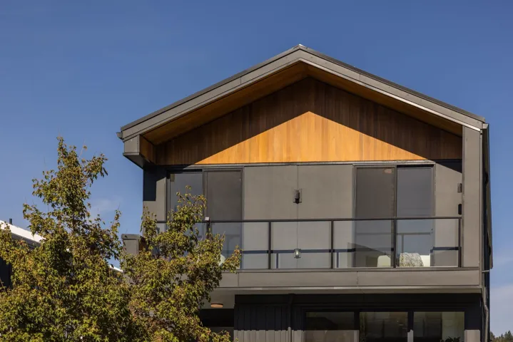 Back of house featuring a balcony