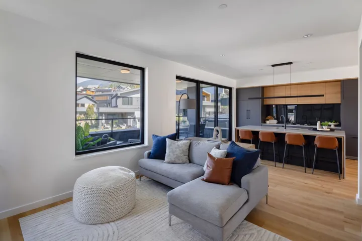 Living area with light wood-type flooring and baseboards