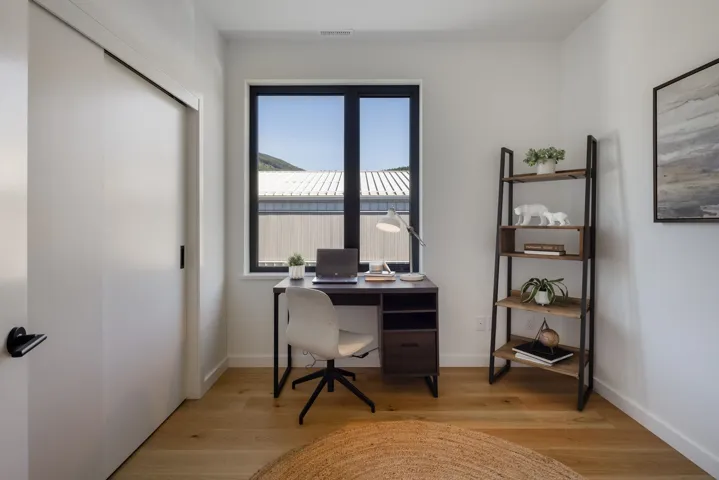 Office area featuring light wood finished floors