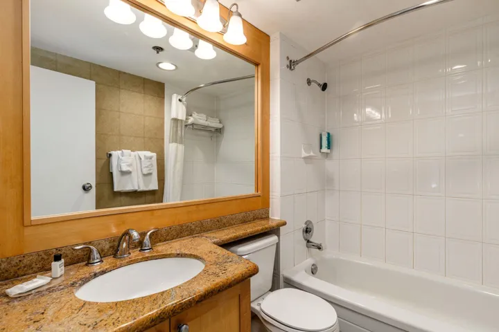 Full bathroom with vanity and shower / bath combo