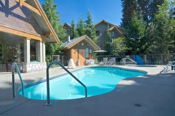 Community pool featuring a patio area