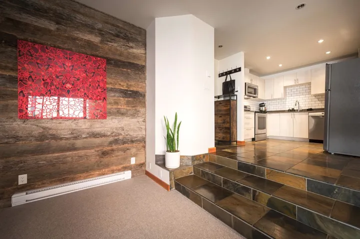 Lobby with wood walls and a sink
