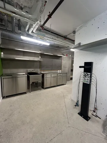 Garage featuring a sink
