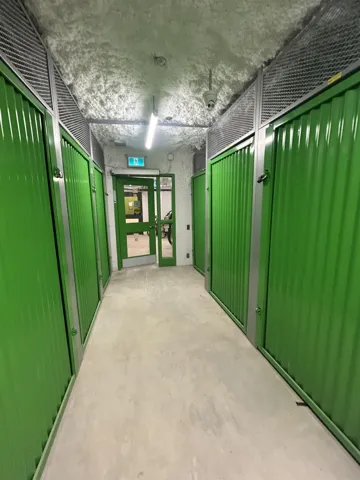 Hall featuring concrete floors