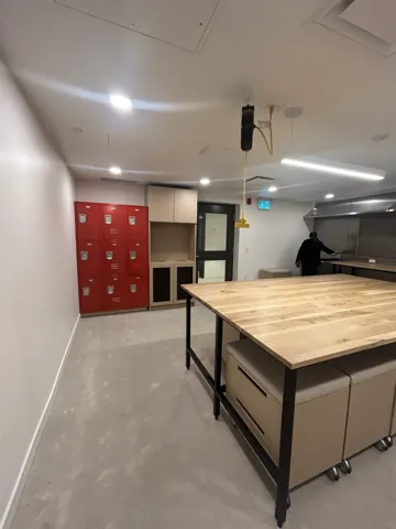 Basement featuring baseboards