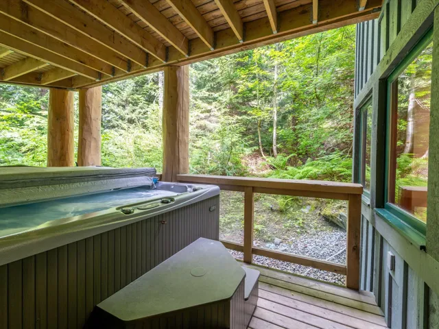 Deck featuring a hot tub
