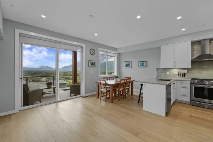 Open floor plan. Living room, kitchen eating area, with balcony, gas fireplace and gorgeous views.