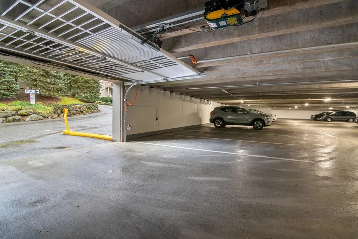 Parking deck featuring a garage door opener