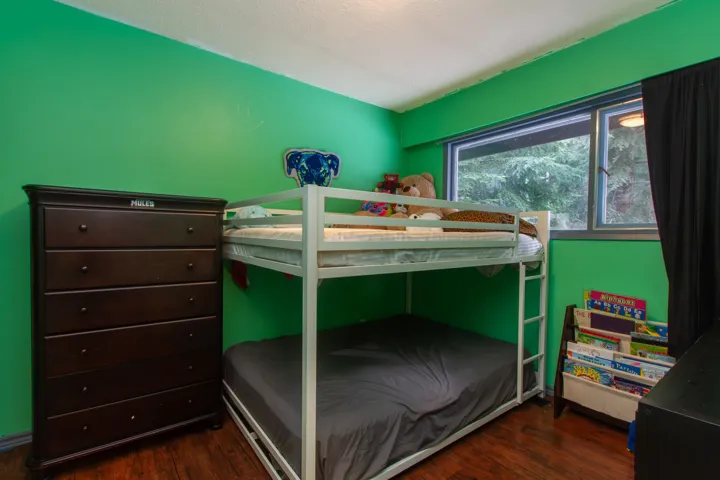 Bedroom with wood finished floors