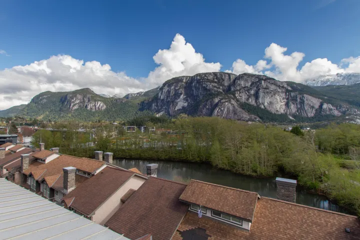 Property view of mountains featuring a water view