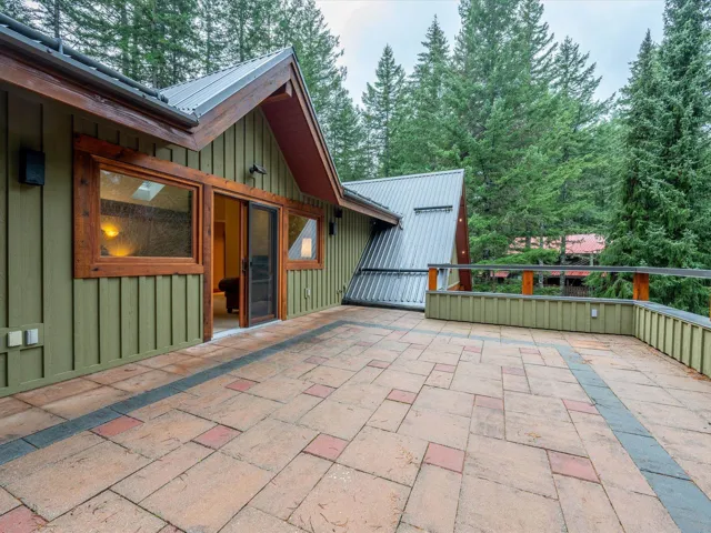 View of patio / terrace featuring view of scattered trees