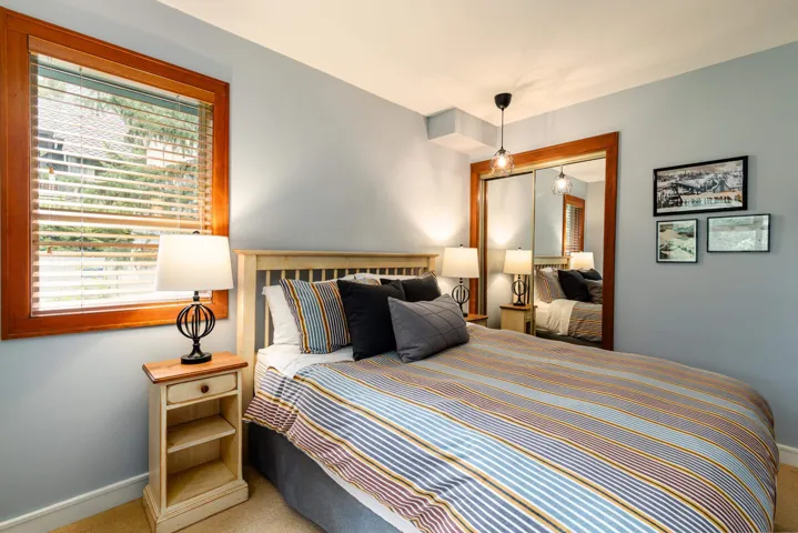 Bedroom with carpet flooring and a closet