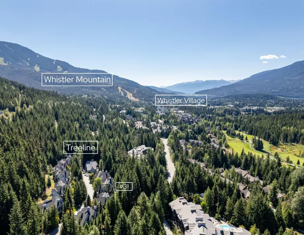 Aerial view of property and surrounding area with mountains and property parcel outlined