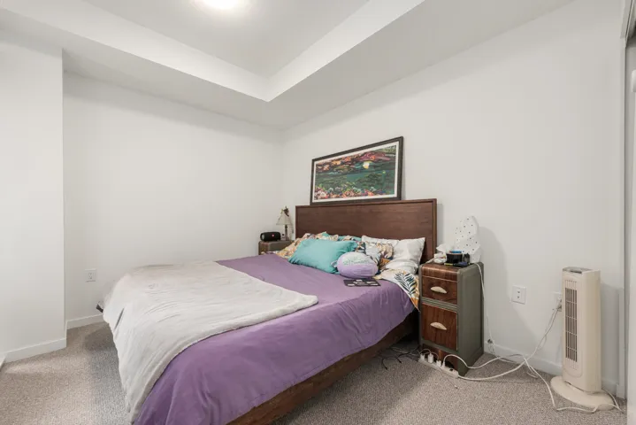 Recessed ceiling featuring integrated lighting and neutral wall finishes