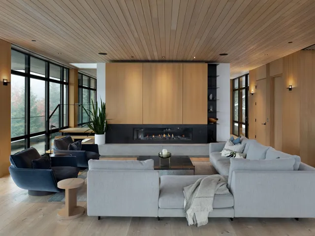 Common area featuring wooden ceiling and floor to ceiling windows