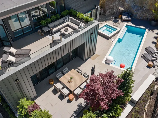 View of subject property with a pool