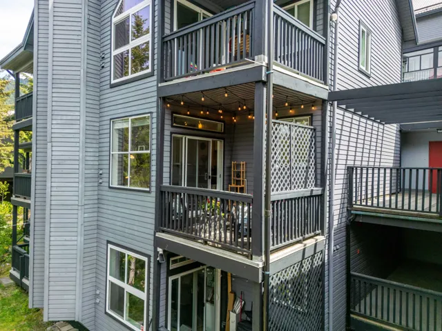 Rear view of property featuring a balcony