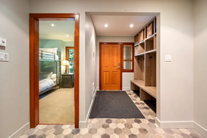 Mudroom featuring recessed lighting and carpet flooring
