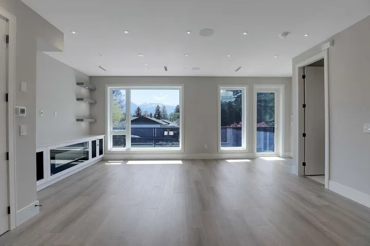 Unfurnished living room featuring recessed lighting and light wood-style floors