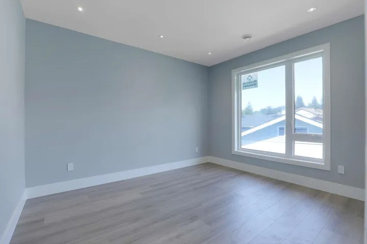 Unfurnished room with light wood-style floors and recessed lighting