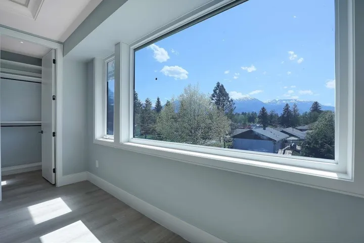 Detailed view of wood finished floors and a mountainous background