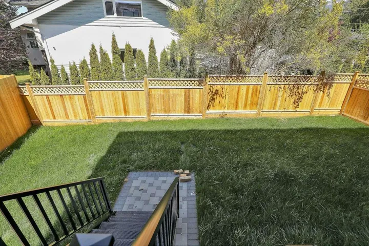 View of fenced backyard
