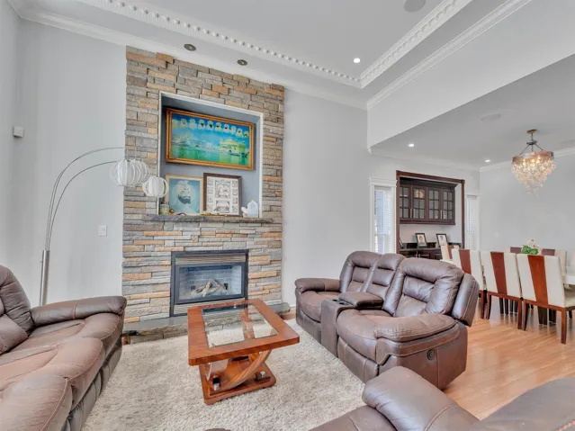 Stacked stone fireplace with a built-in hearth and decorative mantel niche