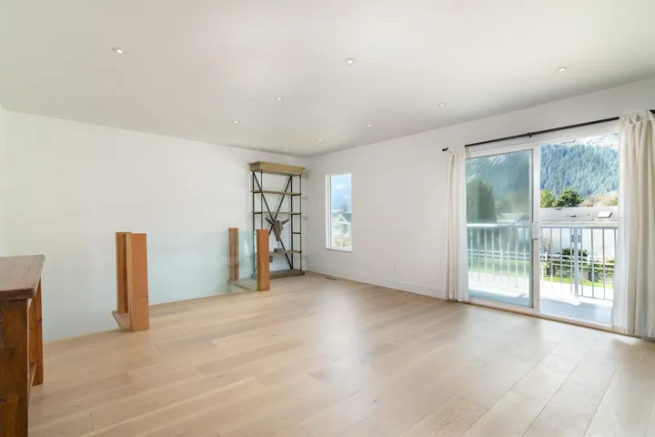 Unfurnished room with recessed lighting, light wood-style floors, and a healthy amount of sunlight