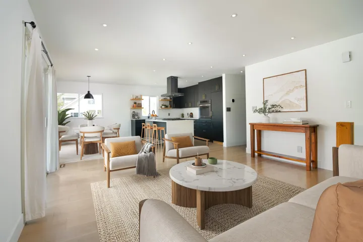 Living area featuring recessed lighting and light wood finished floors