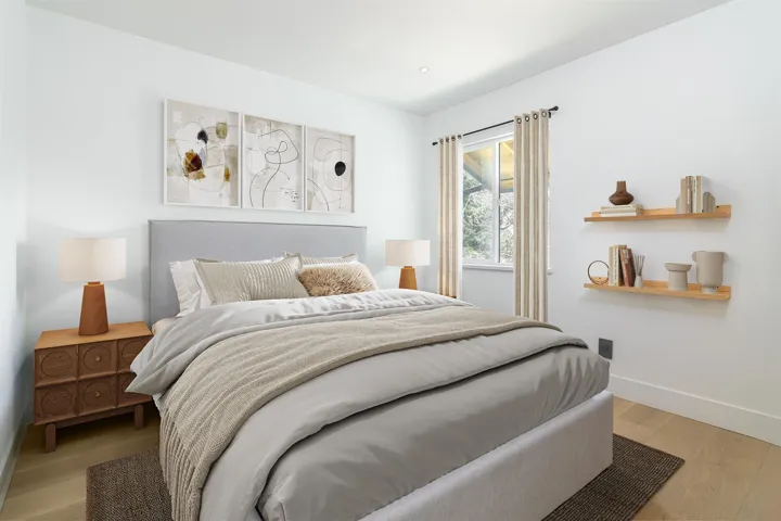 Bedroom featuring light wood finished floors and baseboards