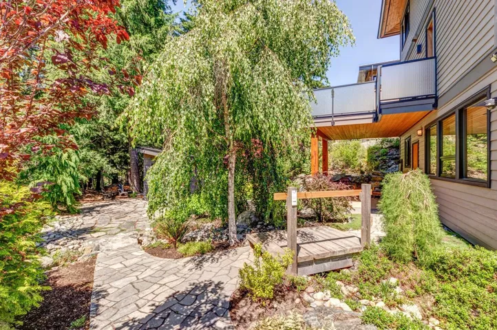 View of yard with a balcony and a patio area