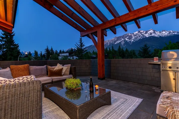 View of patio / terrace featuring an outdoor hangout area, a mountain view, area for grilling, and a pergola