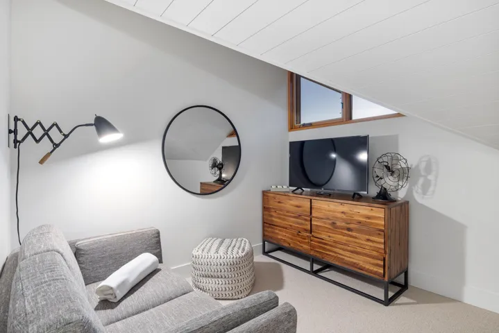 Sitting room with baseboards and carpet