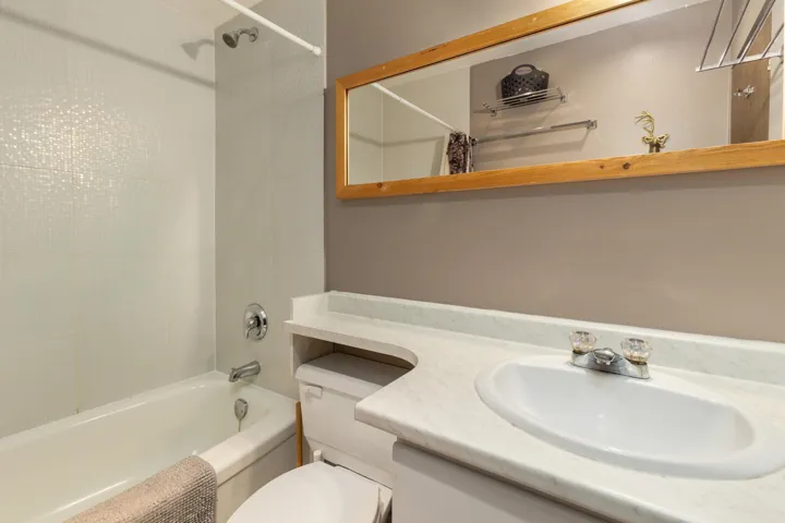 Full bath with vanity and shower / bathtub combination with curtain