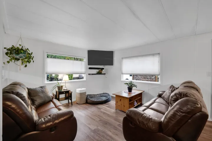 Living room featuring wood finished floors