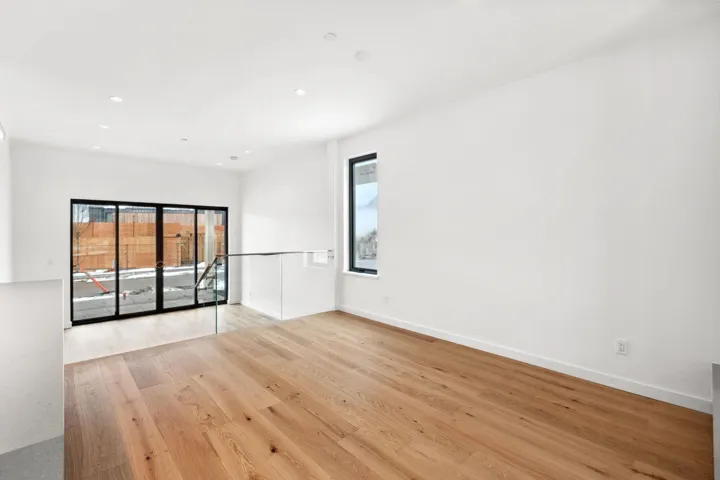 Unfurnished room with baseboards, recessed lighting, and light wood-style floors