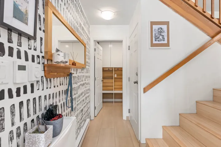 Corridor featuring stairway