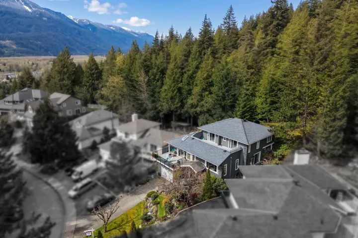 Aerial view of residential area with mountains