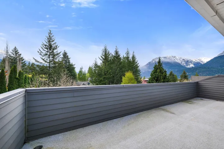 View of patio / terrace featuring a mountain view off Primary Bedroom