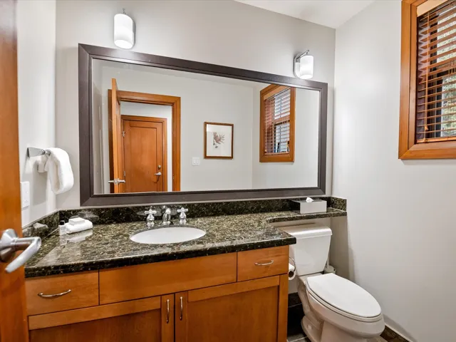 Bathroom with a bath, a shower stall, tile patterned flooring, and vanity