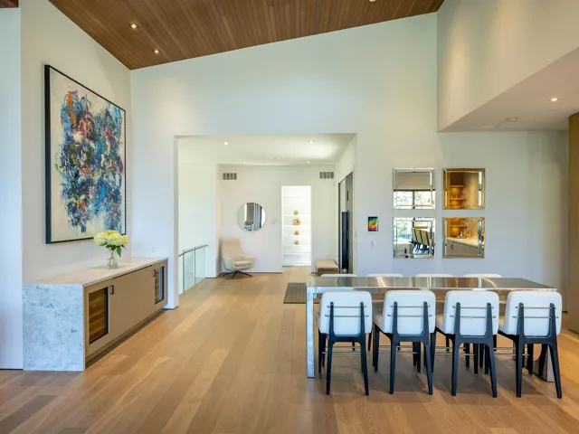 Kitchen with recessed lighting, wood ceiling, a towering ceiling, and modern cabinets