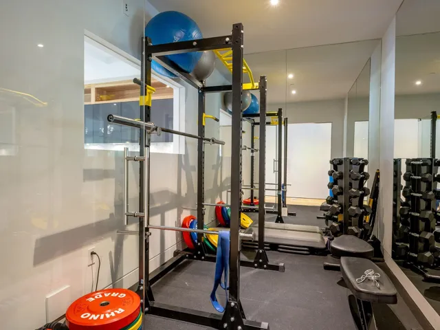 Workout area featuring recessed lighting