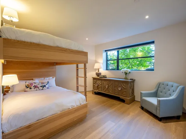 Bedroom with light wood-style flooring and recessed lighting
