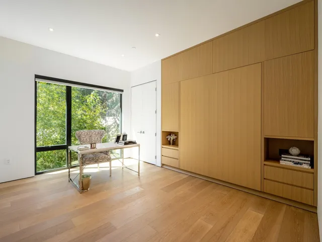 Unfurnished office featuring light wood-type flooring and recessed lighting